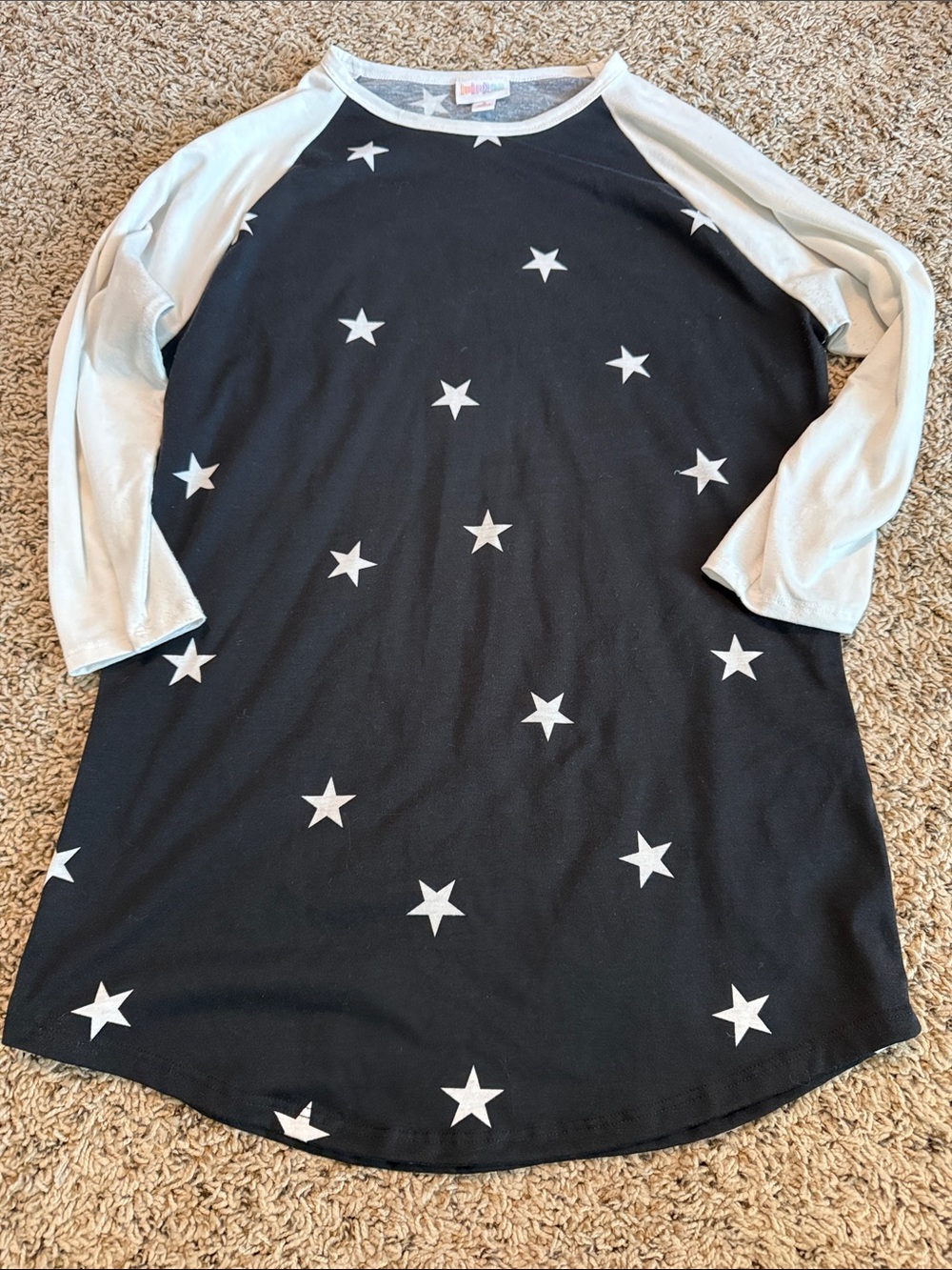 LuLaRoe Black Star Print Raglan Top with White Sleeves